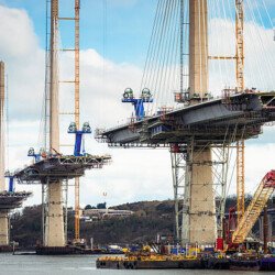 Construction in progress of the new bridge over the Firth of Forth, between Fife and the Lothians.